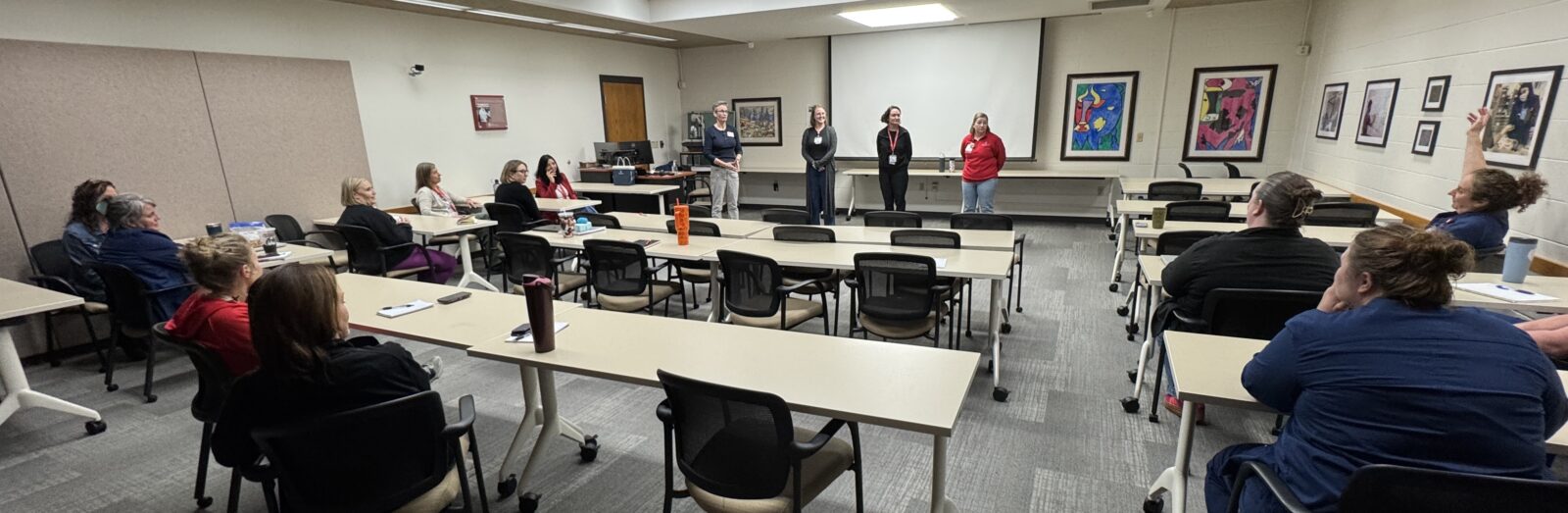 The group at Vet Med is doing improv practice with Amanda Thornton.
